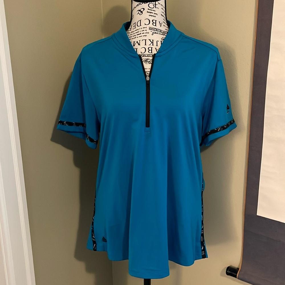 Adidas women’s golf shirt, quarter front zip, turquoise w/black trim. Large